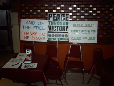 American Legion table with signs