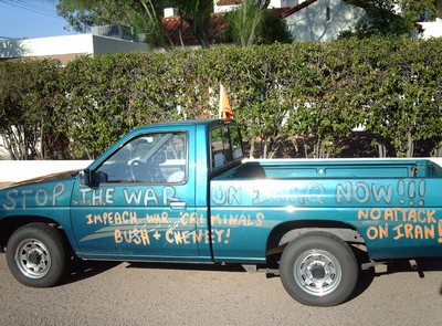 The side of the car painted with slogans