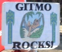 GITMO Rocks - with photo of terrorist in hammock with drink